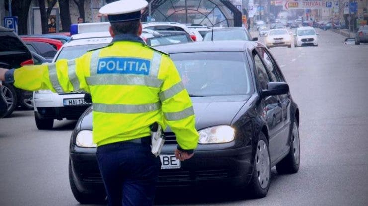 Polițist prins în flagrant. Omul legii a cerut bani pentru a nu trece alcoolemia unui șofer în raport
