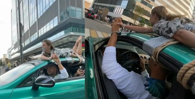 Eveniment șocant filmat! Un bărbat și-a legat iubita de plafonul mașinii și a gonit așa prin oraș. Care a fost motivul gestului 25