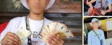 Un băiat de 14 ani din Bihor a furat de la vecini și s-a pozat îmbrăcat în hainele lor și cu banii lor în mână