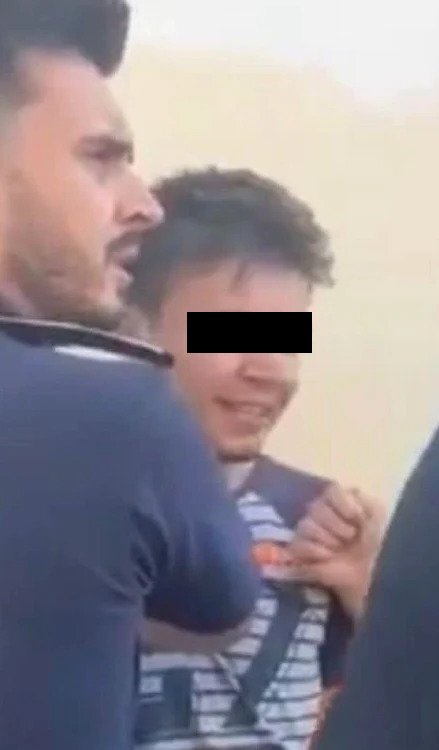 Prima fotografie cu criminalul din Grădina Botanică din Craiova. Tânărul era calm și zâmbea când a fost prins de polițiști 26 Prima imagine cu Mario Alexandru Fojică arestat. Sursă foto: captură video Oltenia TV