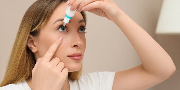 Young,Woman,Using,Eye,Drops,At,Home