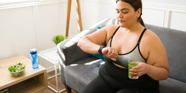 Diet,And,Green,Juice.,Young,Obese,Woman,Looking,At,The